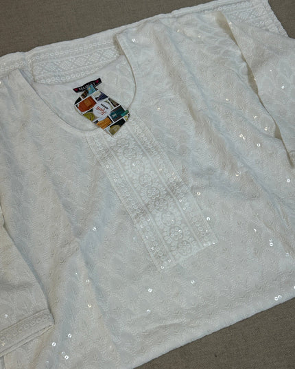White chikankari kurti with light sequin work by Kurti Connection USA