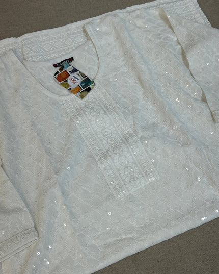 White chikankari kurti with light sequin work by Kurti Connection USA