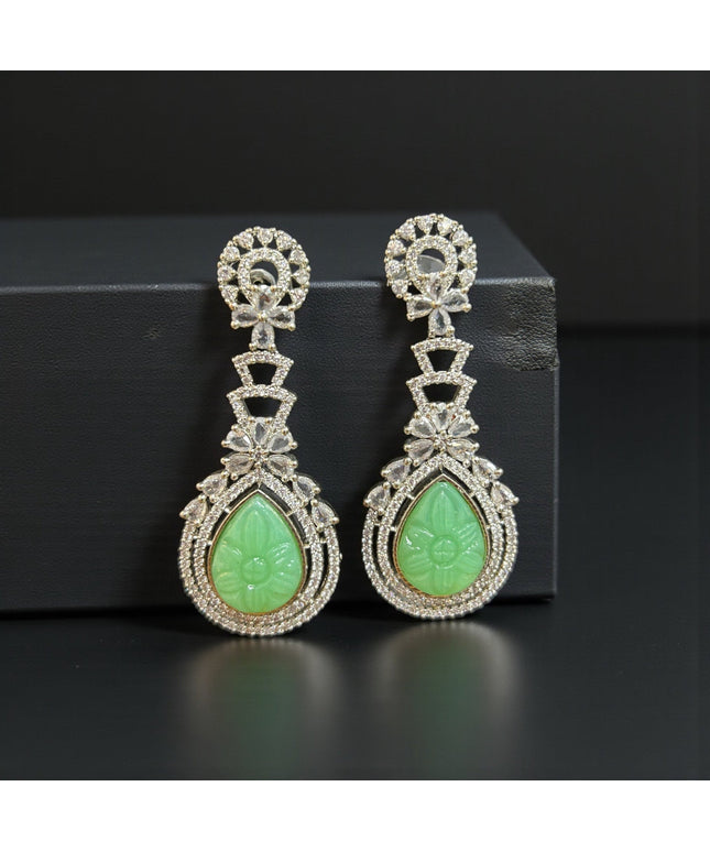 Green carved stone earrings by Kurti Connection USA