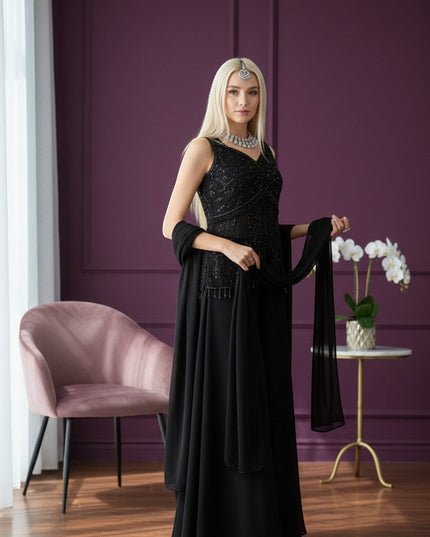 House Of Indian Wedding Attire black sleeveless V-neck palazzo suit with intricate beadwork and sequins, paired with a sheer dupatta.
