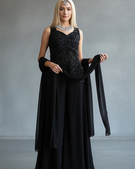 House Of Indian Wedding Attire black sleeveless V-neck palazzo suit with intricate beadwork and sequins, matching sheer dupatta.