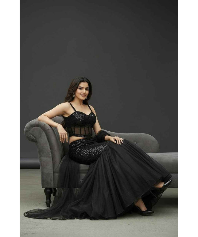Black shimmer lehenga with corset blouse