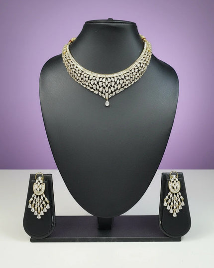 House Of Indian Wedding Attire gold-toned choker necklace and dangling earrings set with clear cubic zirconia stones.