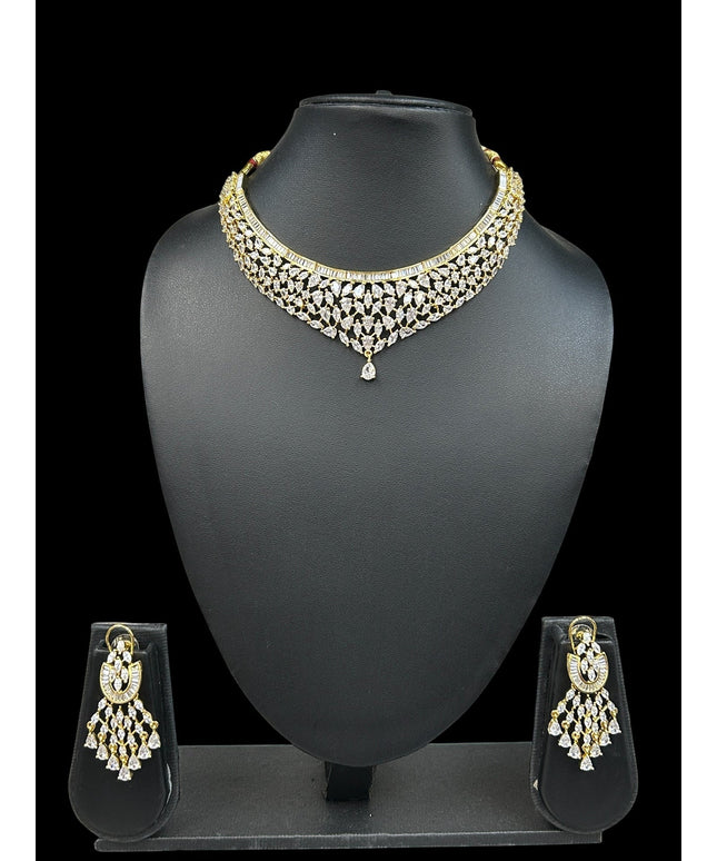 House Of Indian Wedding Attire gold-toned choker necklace with drop pendant and matching dangling earrings, adorned with clear cubic zirconia stones.