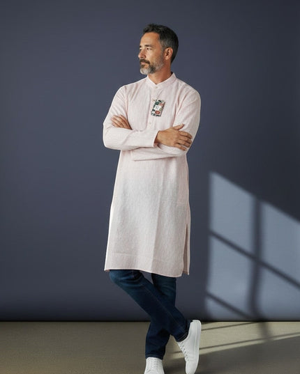House Of Indian Wedding Attire light pink polyester kurta for men with a subtle textured pattern and a decorative patch on the chest.