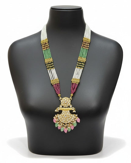 Kurti Connection USA multi-strand beaded necklace with a gold-tone kundan pendant, pearl accents, and teardrop beads.