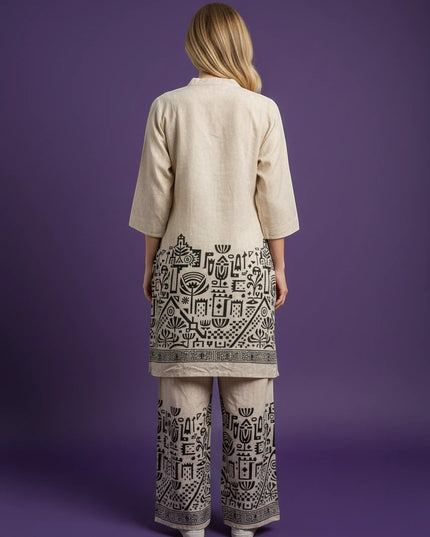 Back view of Kurti Connection USA beige kurti and pant set with black geometric botanical print on a purple background