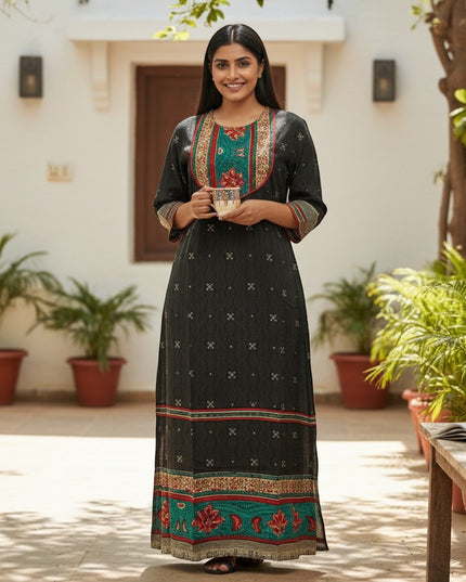 Kurti Connection USA black maxi dress with embroidered neckline and hem, featuring a subtle all-over print and contrasting border details.