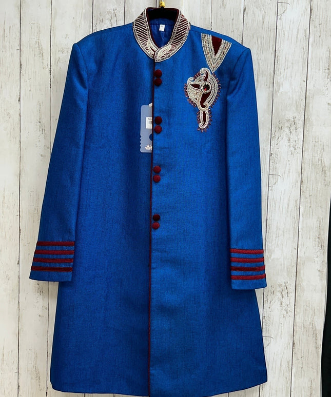 Kurti Connection USA blue sherwani jacket with red velvet accents, mandarin collar, and intricate chest embroidery.