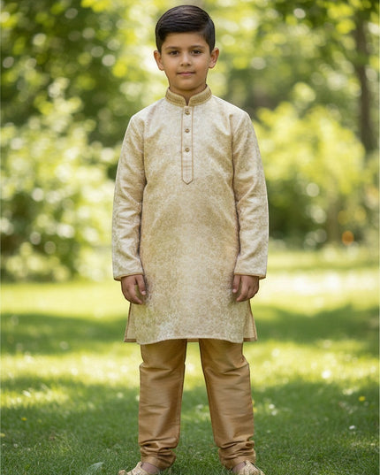 Kurti Connection USA boys cream jacquard kurti with gold pajama pants and embroidered mandarin collar in garden setting
