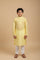 Kurti Connection USA boys yellow embroidered kurta set with mandarin collar and white churidar trousers