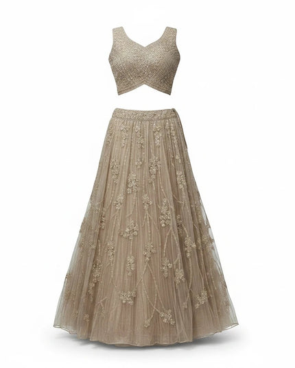 Kurti Connection USA champagne embellished sleeveless crop top and floor-length skirt set with floral embroidery