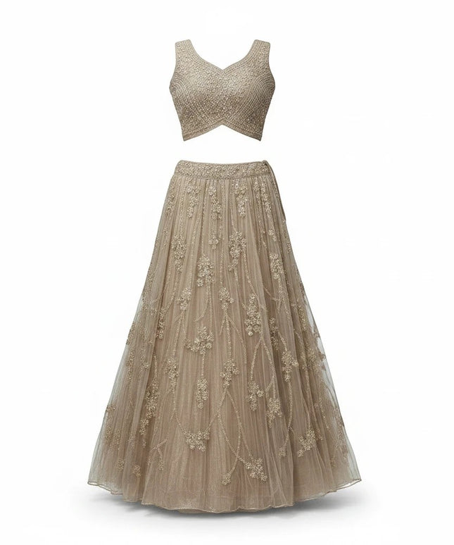 Kurti Connection USA champagne embellished sleeveless crop top and floor-length skirt set with floral embroidery