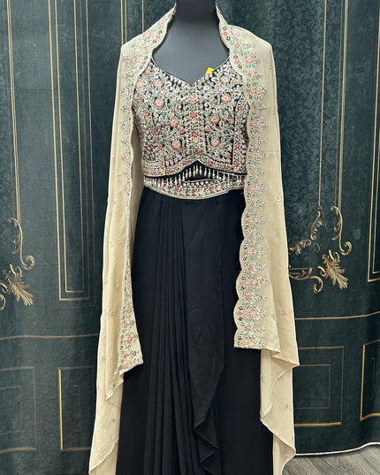 Kurti Connection USA black ethnic gown with floral embroidered bodice and sheer neutral cape on a mannequin