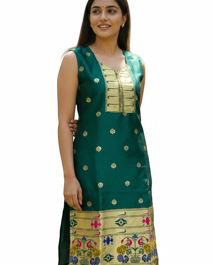 Kurti Connection USA emerald green silk sleeveless kurta with gold zari motifs, embellished neckline, and peacock border hem.