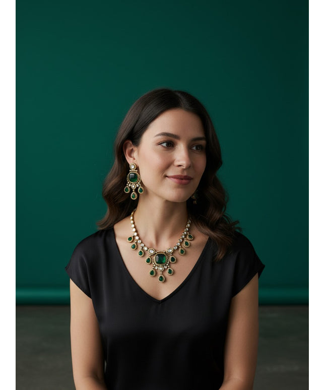Kurti Connection USA emerald green doublet stone necklace and earring set worn by a woman in a black top
