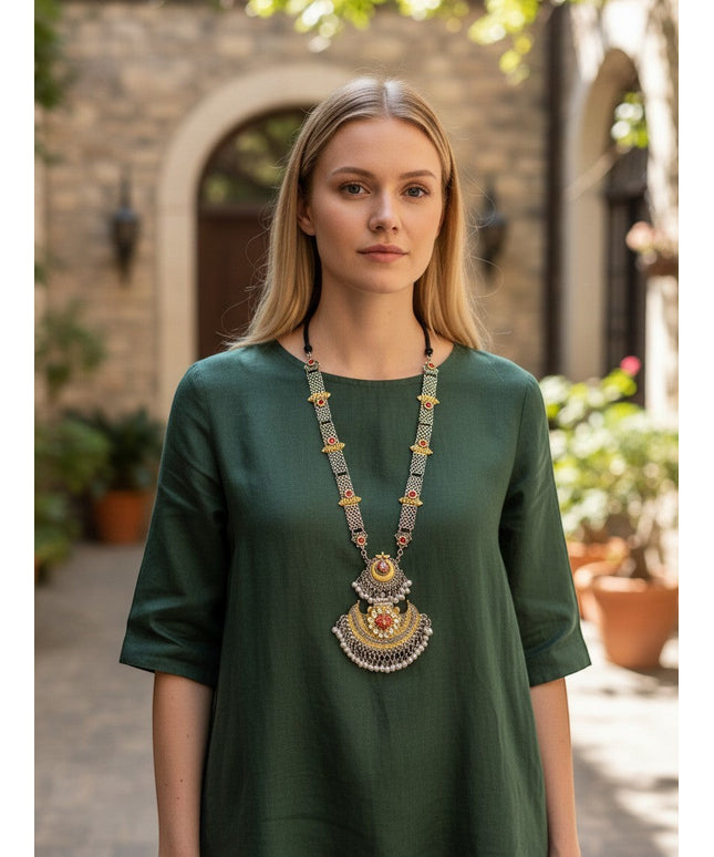 Kurti Connection USA traditional ethnic statement necklace with oxidized silver, gold accents, red stones, and pearls.