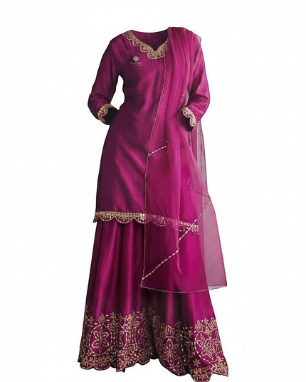 Kurti Connection USA magenta silk sharara suit with gold embroidery on neckline, cuffs, and hem. Includes sheer dupatta.