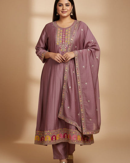 Kurti Connection USA mauve kurta set with intricate multi-colored embroidery on the neckline, hem, and matching dupatta.