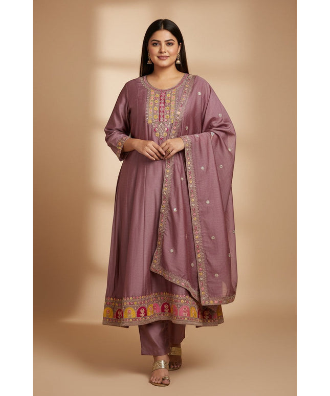 Kurti Connection USA mauve kurta set with intricate multi-colored embroidery on the neckline, hem, and matching dupatta.