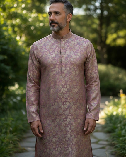 Kurti Connection USA men's mauve kurta with gold floral motifs, mandarin collar, and button-down placket in a garden.