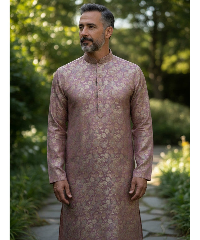 Man wearing a Kurti Connection USA mauve kurta with gold floral motifs, mandarin collar, and long sleeves outdoors.