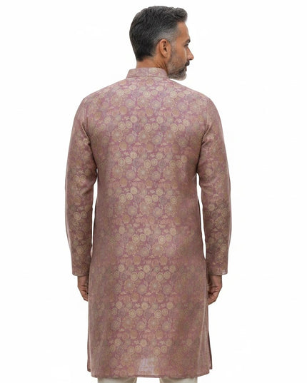 Back view of a man wearing a mauve Kurti Connection USA ethnic kurta with shimmering gold floral motifs.