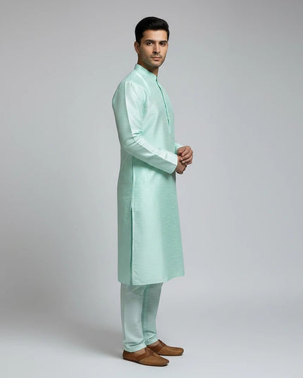 Kurti Connection USA mint green traditional men kurta pajama set with mandarin collar worn by a male model