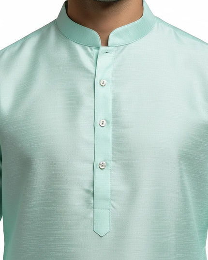 Kurti Connection USA mint green men's kurta featuring a mandarin collar and button-down placket in premium fabric.
