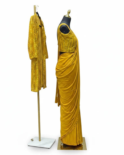 Kurti Connection USA mustard yellow saree with ruffle border and matching sequin embellished long-line shrug