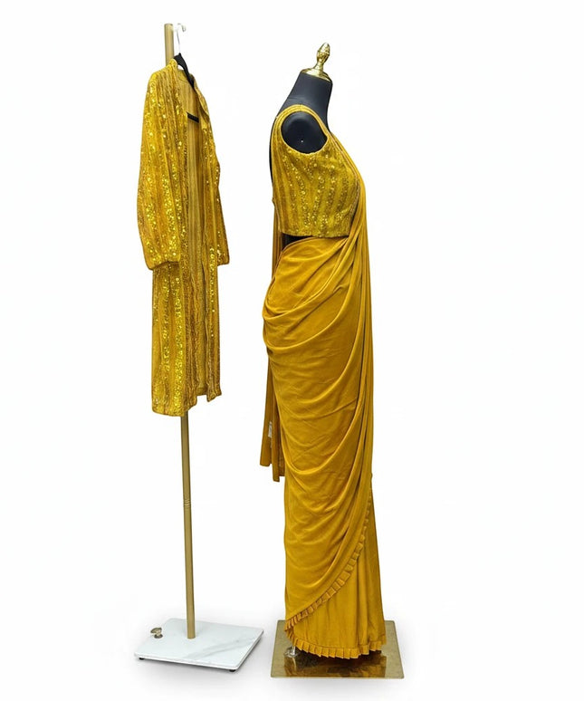 Kurti Connection USA mustard yellow saree with ruffle border and matching sequin embellished long-line shrug