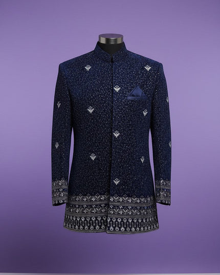 Kurti Connection USA navy blue Bandhgala jacket with silver embroidery and patterned border on cuffs and hem.