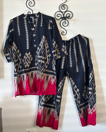Kurti Connection USA navy tunic and trouser set with beige geometric patterns and vibrant pink hem accents.