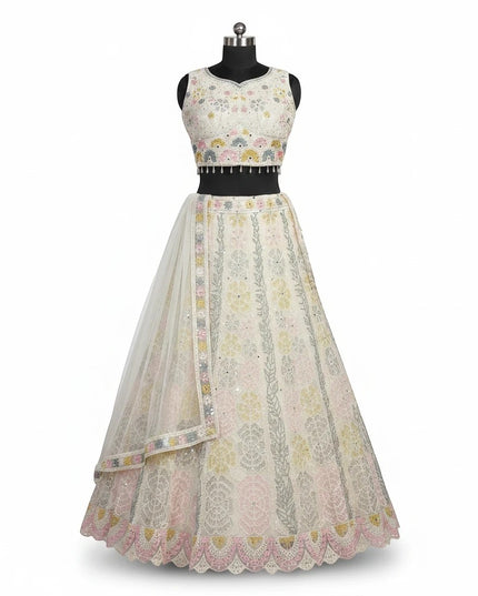 Kurti Connection USA off white lehenga choli with intricate pastel floral embroidery and scalloped hem detail