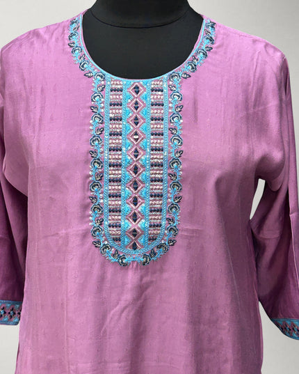 Kurti Connection USA pink kurti tunic with intricate multi-colored embroidery on the neckline and three-quarter sleeves