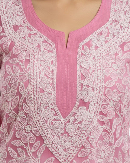 Kurti Connection USA pink tunic top featuring intricate white floral embroidery and a flattering scoop neckline.