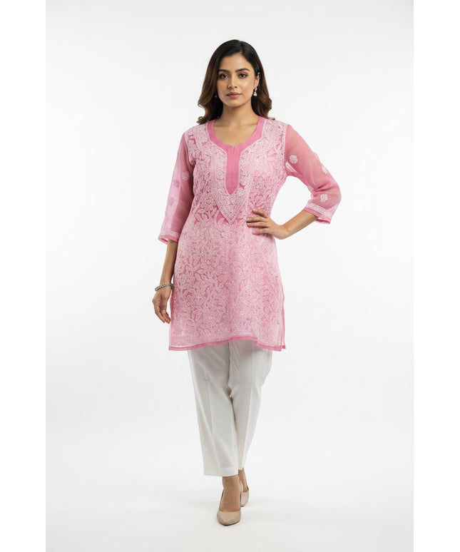 Kurti Connection USA pink kurti tunic with intricate white floral embroidery, scoop neckline, and three-quarter sleeves.