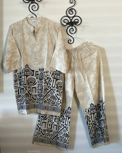 Kurti Connection USA beige kurti and pant set with black geometric and botanical print on the hem