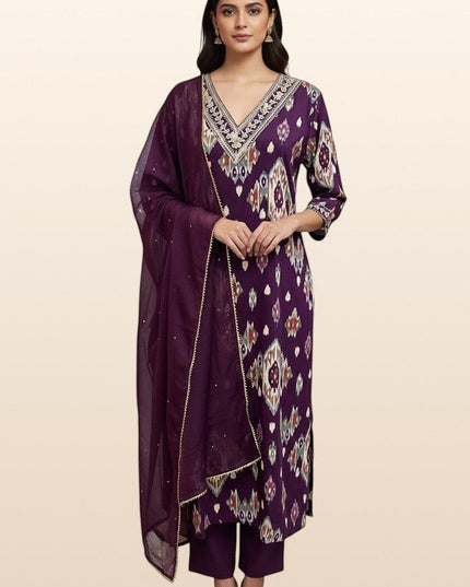 Model wearing a Kurti Connection USA purple ikat-patterned kurti set with V-neck embroidery and a sheer dupatta.