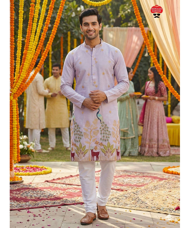 Kurti Connection USA light purple silk kurta set with intricate embroidery of peacocks and deer, paired with white pajama.