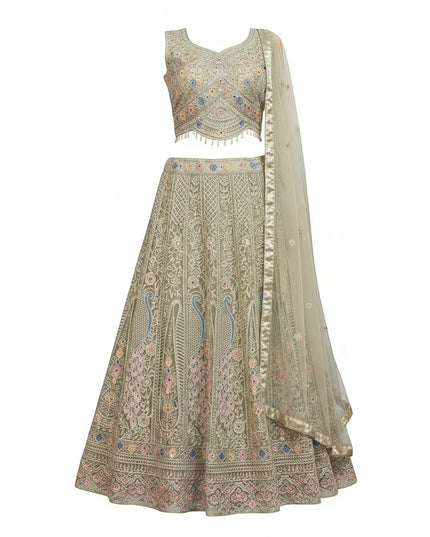 Kurti Connection USA sage lehenga choli with multi-colored floral embroidery, mirror work, and beaded scalloped hem.