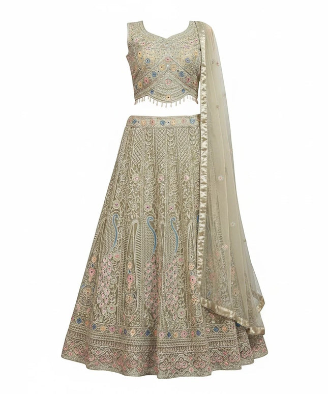 Kurti Connection USA sage lehenga choli with multi-colored floral embroidery, mirror work, and beaded scalloped hem.