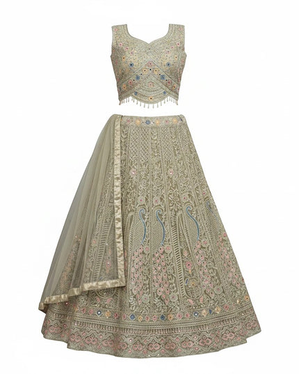 Kurti Connection USA sage lehenga choli with multi-colored floral embroidery, mirror work, and scalloped bead hemline.