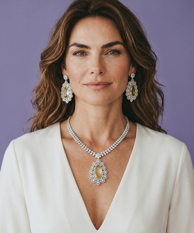 Kurti Connection USA statement necklace and teardrop earrings set with yellow stones and clear crystals.