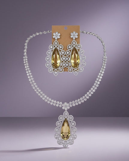 Kurti Connection USA statement necklace set with teardrop yellow stones and clear cubic zirconia, matching drop earrings.