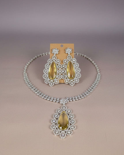 Kurti Connection USA statement necklace set with teardrop yellow stones and clear cubic zirconia in silver tone.
