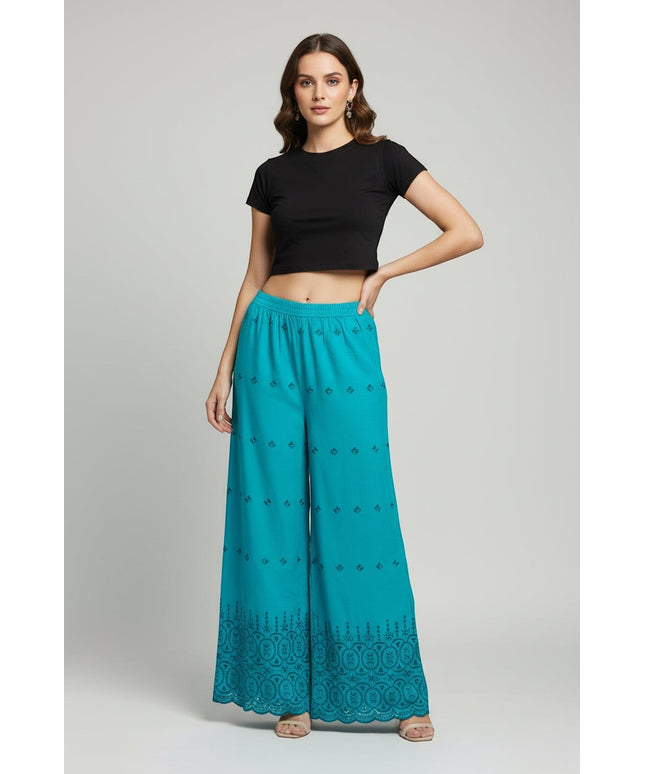 Kurti Connection USA teal wide-leg palazzo trousers with intricate embroidery and scalloped hem on a model