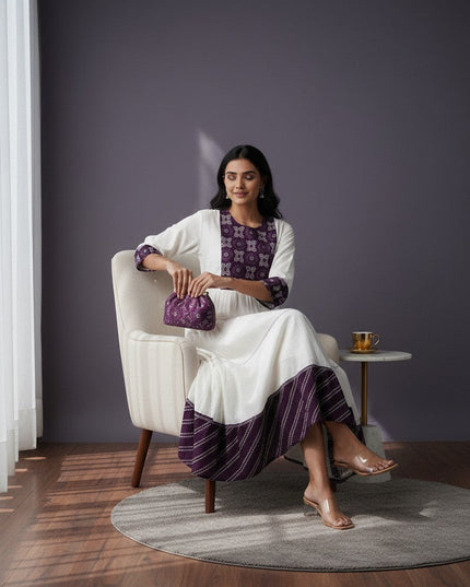 Kurti Connection USA white tiered maxi dress with purple embroidered yoke and cuffs, flowing silhouette.