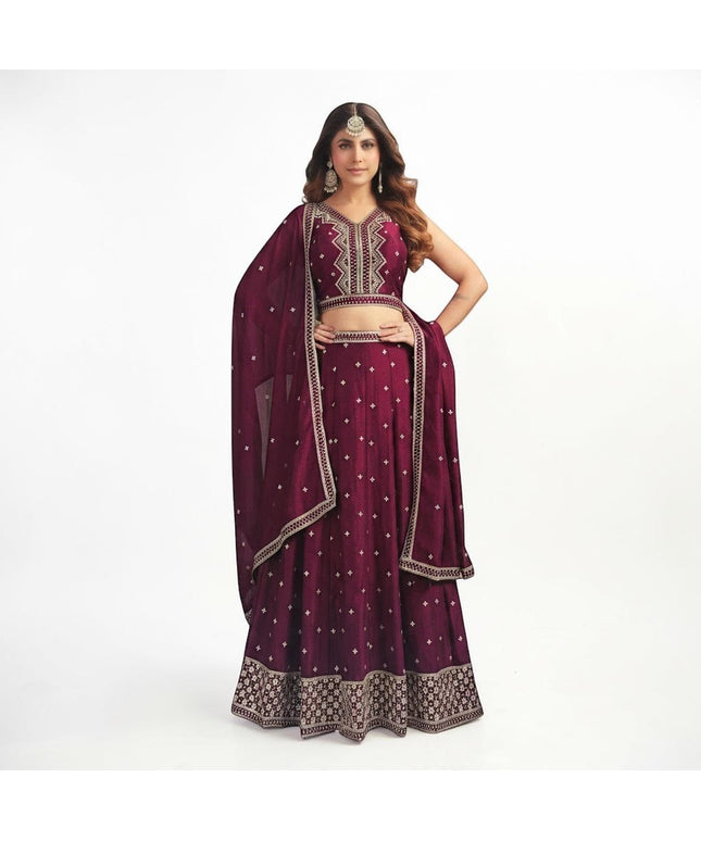Kurti Connection USA wine sleeveless lehenga choli with silver embroidery and matching dupatta on a model